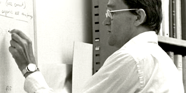 SLAC Physicist Bj Bjorken solving an equation at a chalkboard