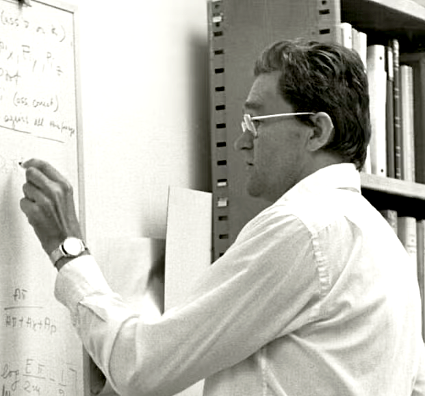 SLAC Physicist Bj Bjorken solving an equation at a chalkboard